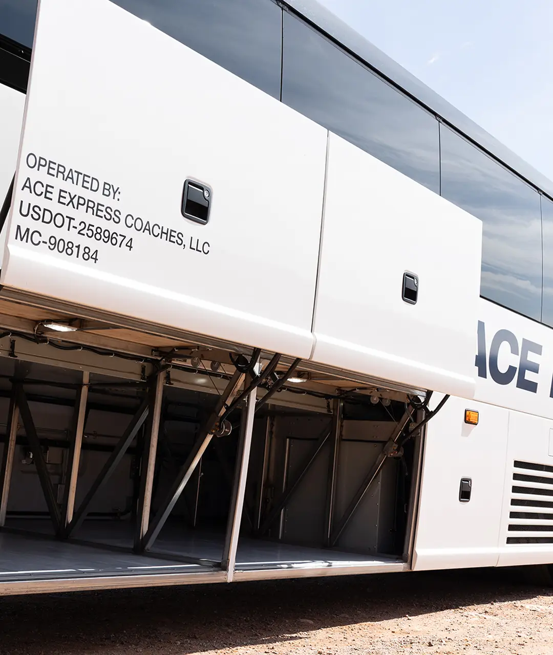 Luxury coach motorcoach operated by Ace Express Coaches, LLC with company info visible.
