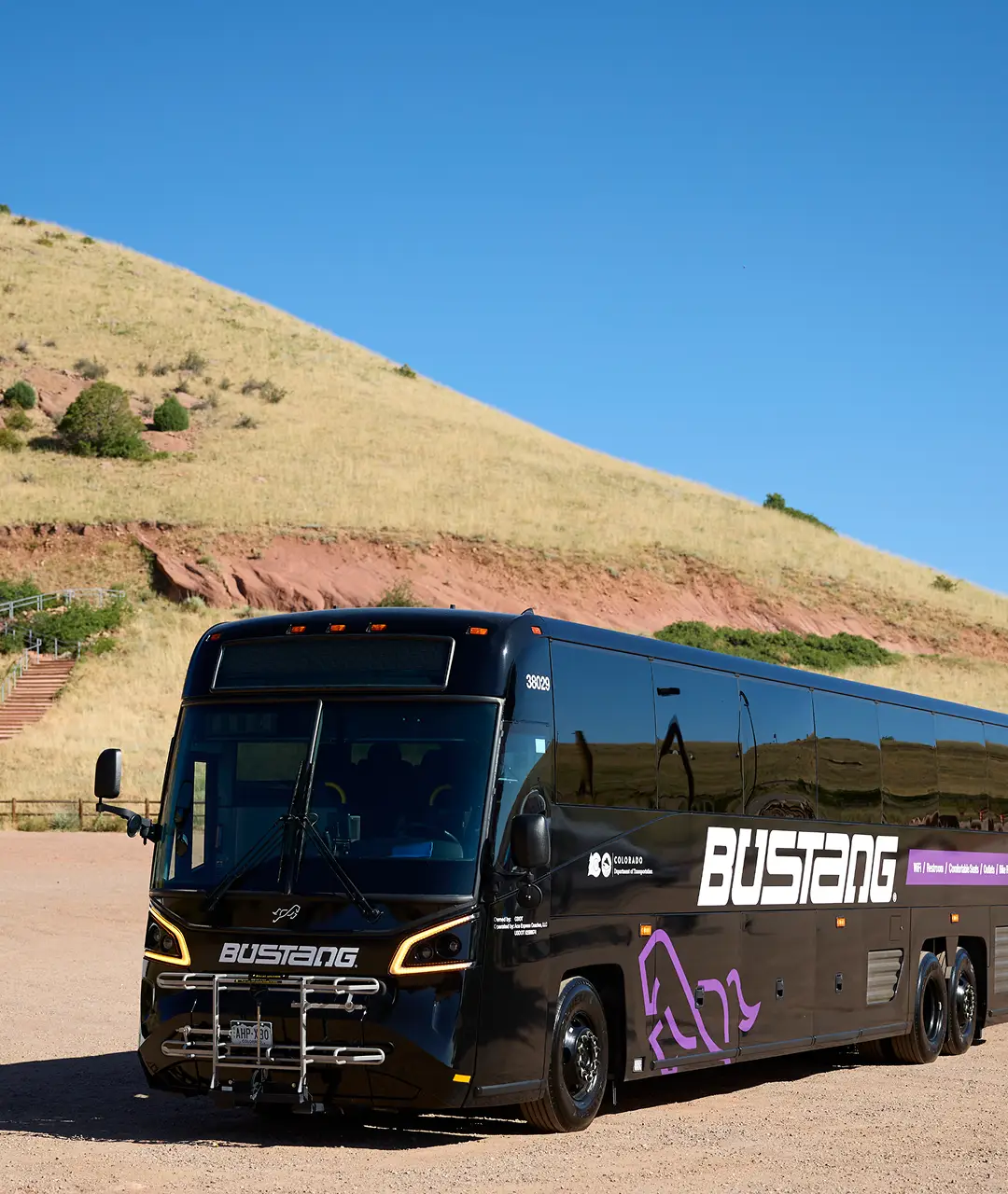 BusTeng luxury coach parked outdoors with hills in the background.